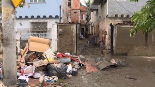 Rio residents struggle to recover after flash floods