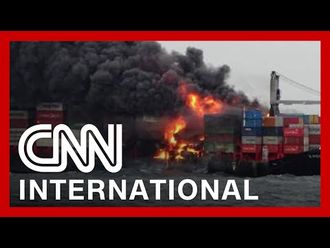 Burning ship may cause disastrous oil spill
