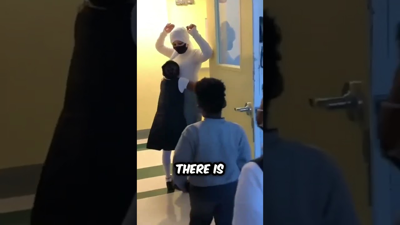 These students must hug the teacher to enter!