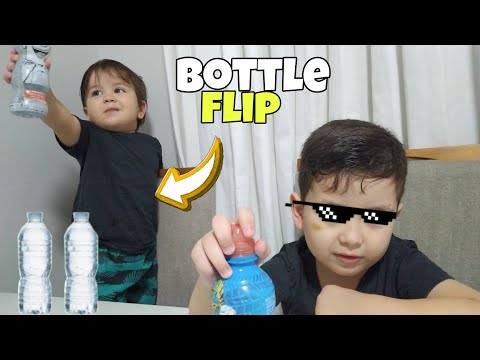 BRINCADEIRA EM FAMÍLIA - DESAFIO DA GARRAFA ( BOTTLE FLIP GAME ) - BIEL E TUTU