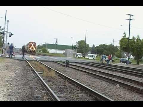 CP intermodal lead by a gevo and a soo line sd 60 leaves bensivlle with s shave and a hair cut