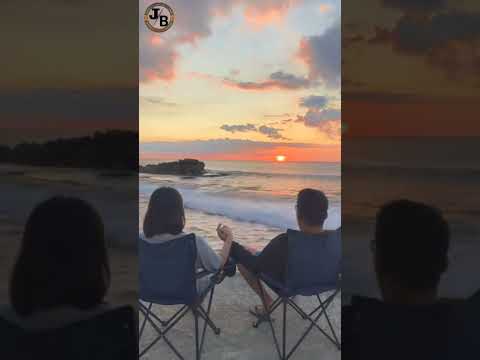beautiful couple enjoying sunset