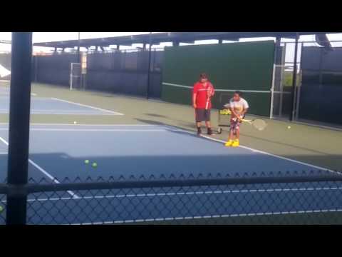 Ashley Flood at 6 months of ever playing tennis