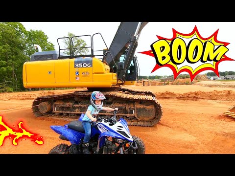 Kid Riding his Brand New ATV at Construction Site with Tractors | ATVs for Kids
