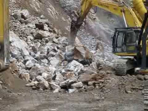 Rammer Large Range Hammer being using to clear a Landslide Rammer Large Range Hammer being using to clear a Landslide