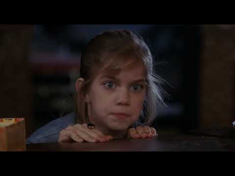 Official trailer thumbnail for My Girl (1991) with Anna Chlumsky and Macaulay Culkin smiling in summer light