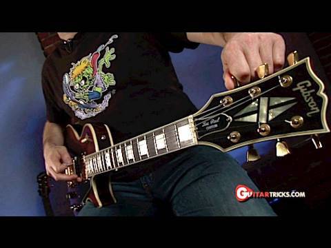 Drop D Tuning - Guitar Tuning Lesson-  Guitar Tricks 24