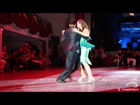  Sebastian Achaval  and  Roxana Suarez  are  dancing  to  Juan D'Arienzo  at  Lisbon International Tango Festival  in  2016