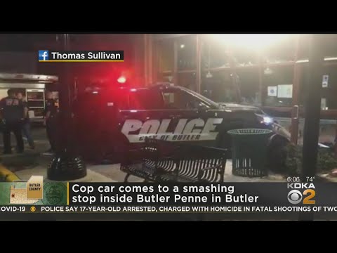 City Of Butler Police Car Slams Into Business