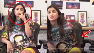 Alia Bhatt touches her bump and then smells it in 