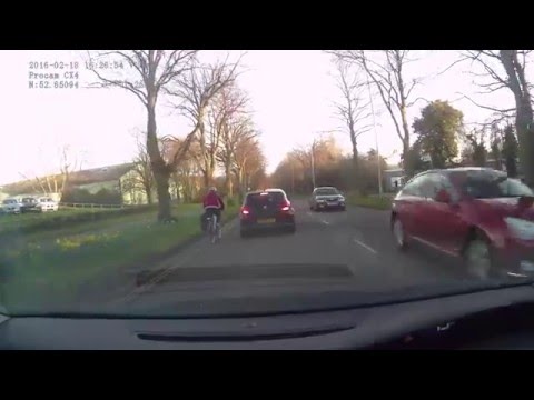 YF58LLX cutting up a cyclist