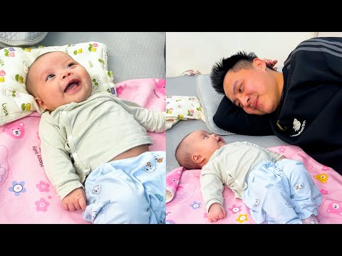 Baby Banh Bao has learned to smile when Dad communicates with her