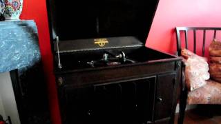 Old grammophone playing Masculine Women, Feminine Men