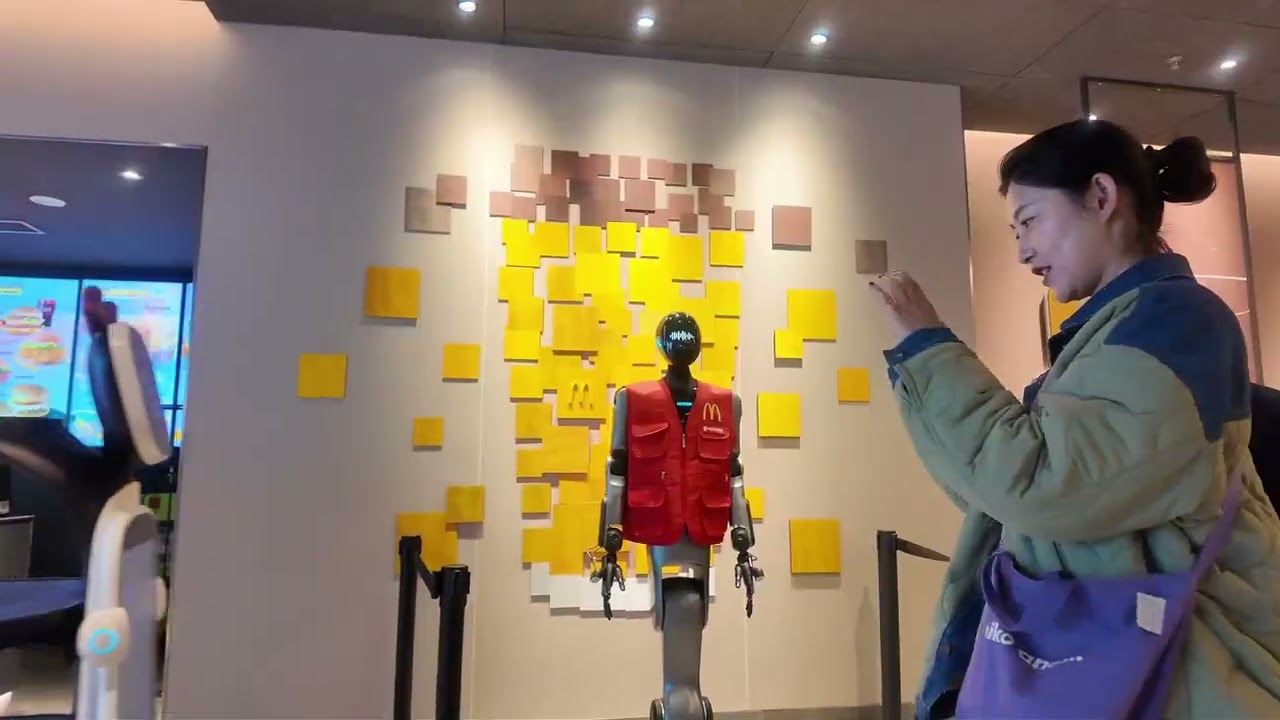 KEENON robot squad suit up and join the McDonald&rsquo;s party! - YouTube