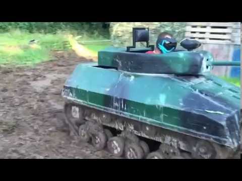 Taking the tank for a spin in the mud at Top Tanks Paintball.