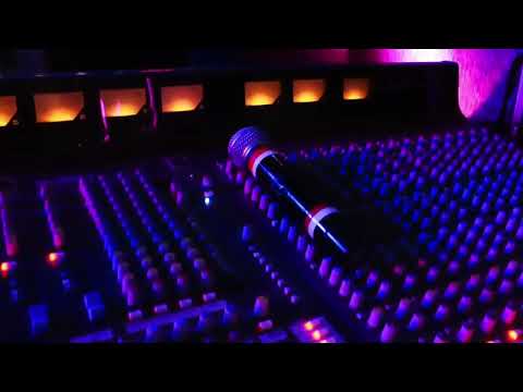 The Amateur (2025) club chase scene elecronic music