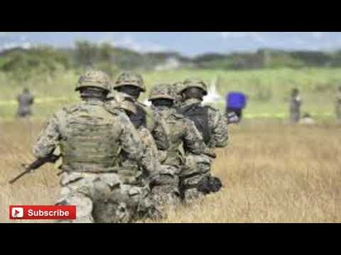 JDF soldier shot on kill in Jamaica sept 24 2000 pound of weed be taken by the JDF