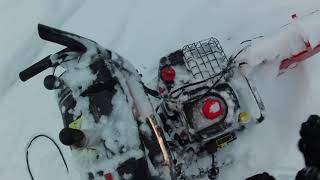 Cold start of Jonsered ST2111E snowblower with hel