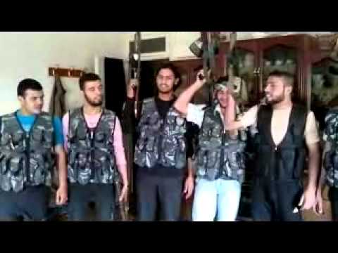 أغنية ثورية من قبل عناصر كتيبة معاذ بن جبل في مدينة حمص