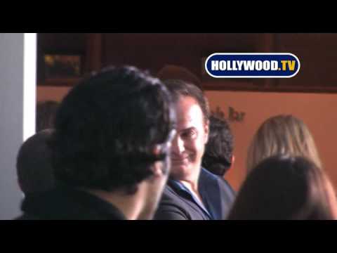 Kim Basinger Gives Cameras A Quick Wave