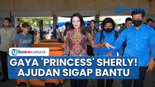 Gaya Sherly Curi Perhatian, Sang Ajudan Sigap Bantu Gubernur Malut Lewati Jalan Licin di Ternate