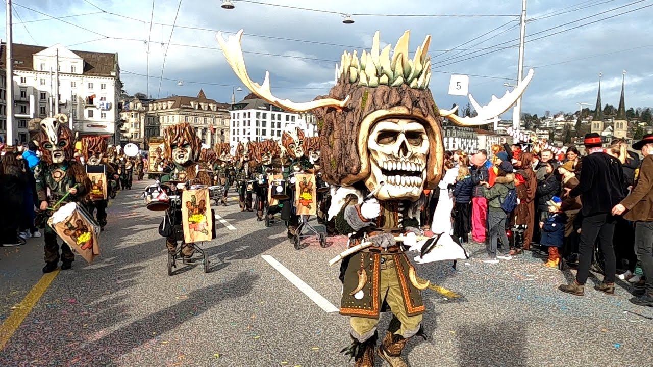 Dance through the streets alongside costumed performers, embracing the joyous chaos that defines this beloved Swiss tradition.