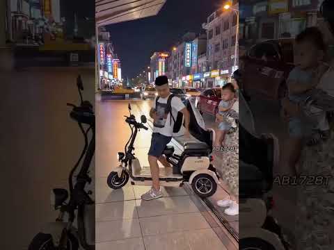 a motorcycle capable of carrying three people in the sidecar