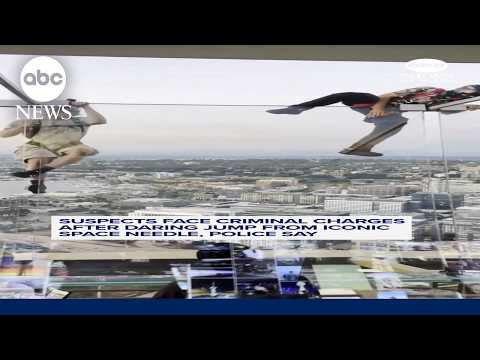 Daredevils jump from Space Needle in Seattle