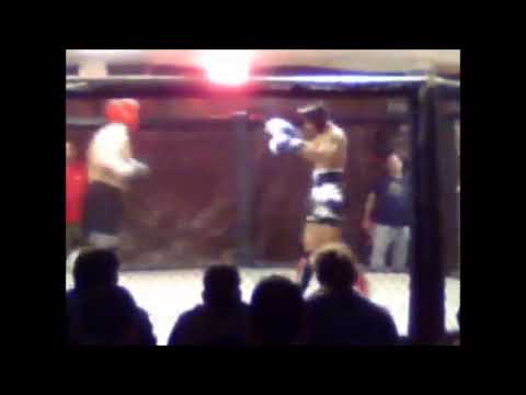 NY San Da fighter doing a match in the cage, Muay Thai, San Da, Mixed Martial Arts (MMA), Kickboxing