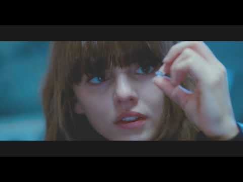 Split-screen collage from the trailer: London and New York flipping past, phone screens and diamonds