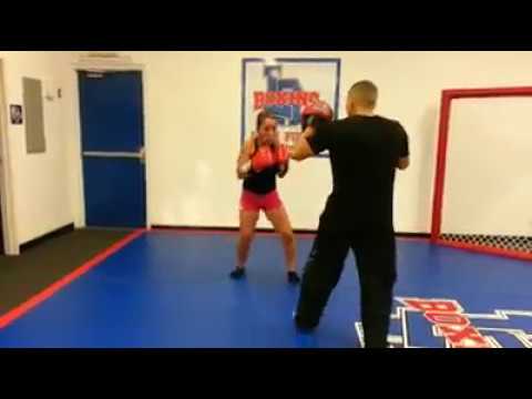 Working mitts, rolling under & countering drill. Natalia is a fast learner.