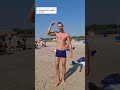 Beach Boy shows Muscles #Shorts