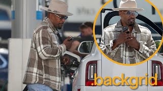 Jamie Foxx stops to fill the tank of his Rolls-Royce in Los Angeles