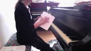 Piano student, Fritz, 9, composes a Boogie piece (early draft)