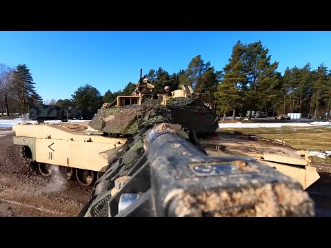 U.S. Army M1A2 Abrams Tanks And Infantry Train With Lithuanian Troops During NATO Exercise