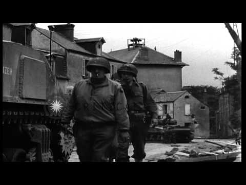 A military tank on a street in St Lo, France. HD Stock Footage