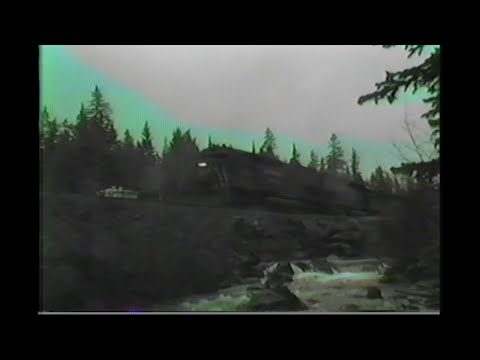 1118. SOUTHERN PACIFIC SP HELPER set at Cascade Summit Oregon on May 28 1990 with 5 freight engine m