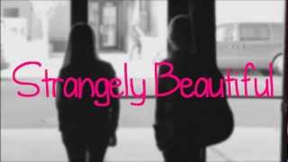 Shealeigh - Strangely Beautiful - Lyrics + Download Link