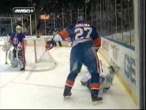 Milan Jurcina drills Mason Raymond