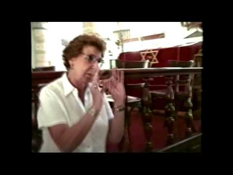 Stella Levi answering questions June 2002 at the Kahal Shalom in Rhodes