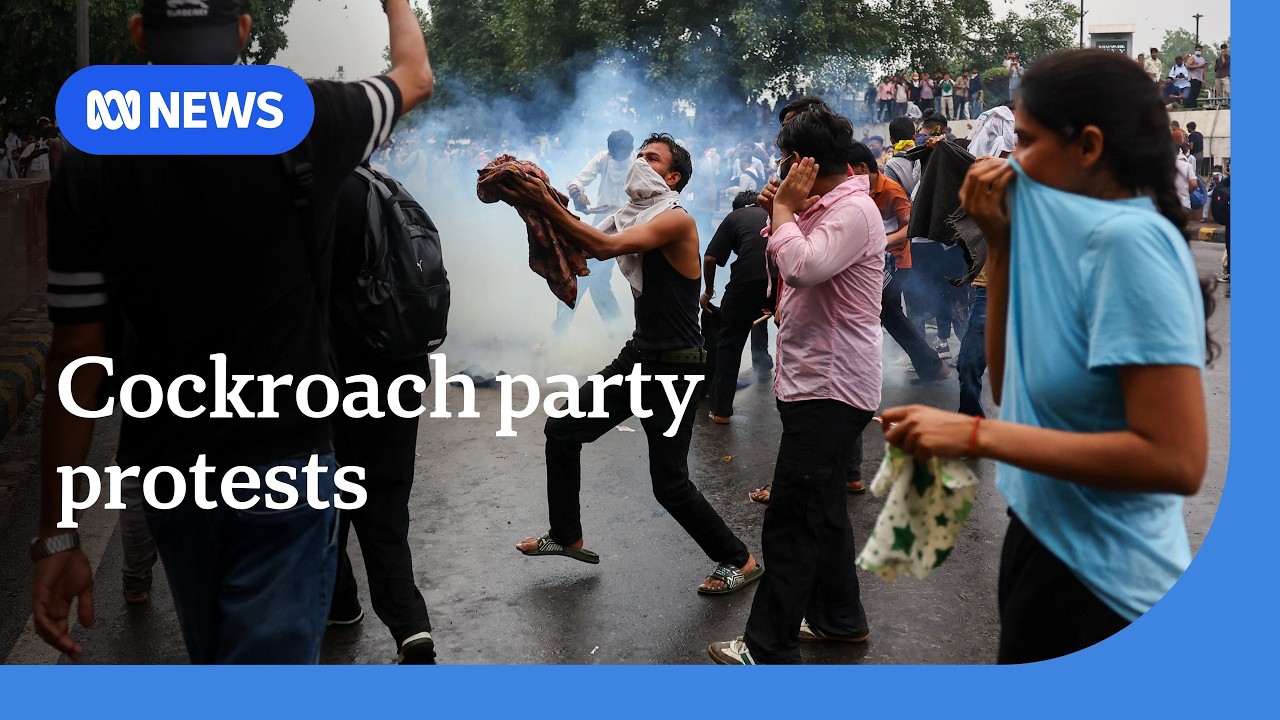 India police fire tear gas on youth protesters marching toward parliament in Delhi
