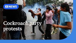 India police fire tear gas on youth protesters marching toward parliament in Delhi