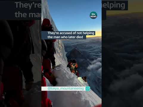 Climbers climb round man dying on mountain #itvnews