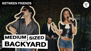 Between Friends Live in the Medium Sized Backyard