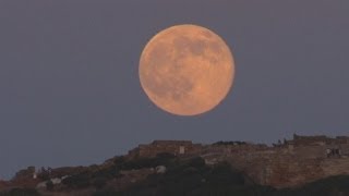 Supermoon lights up the sky over ancient Greek temple and around the world