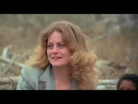 Hair trailer frame suggesting a candlelit vigil, echoing the finale’s choral ‘Let the Sunshine In’