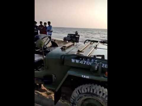 Willy's without driver in the beach