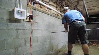 Watch video: GeoLock Installation: Fixing a Bowing Wall