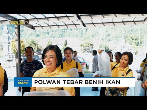 POLWAN POLRES BANGLI TEBAR BENIH IKAN DI DANAU BATUR