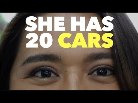 彼女は20台の車を持っています (She Has 20 Cars)